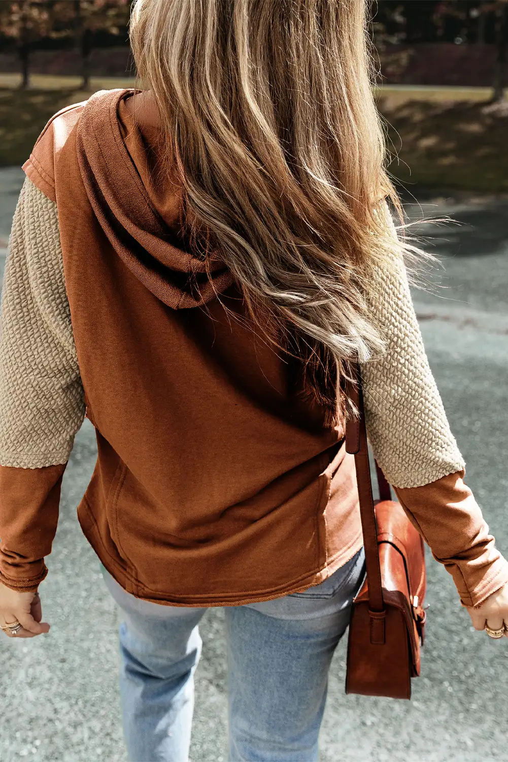 Close look at the hoodie’s color play in natural daylight