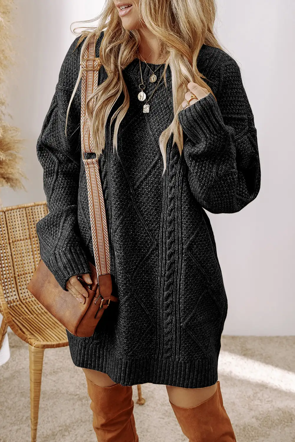 Relaxed full-length view of the sweater dress