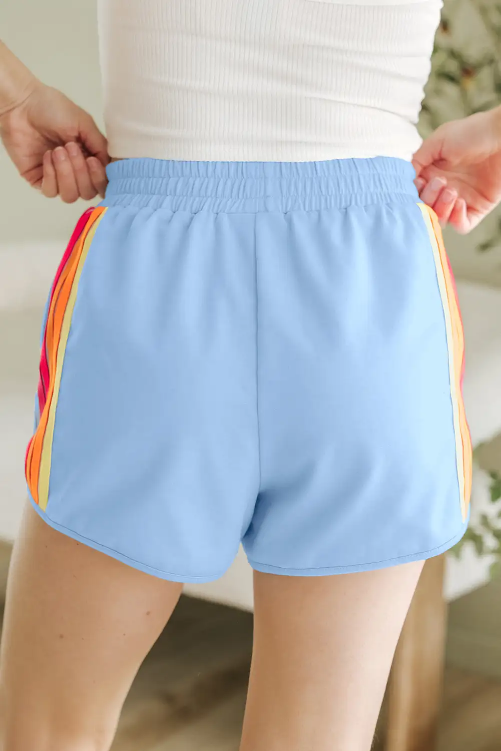 Studio still of the Beau Blue color-block shorts on a clean backdrop