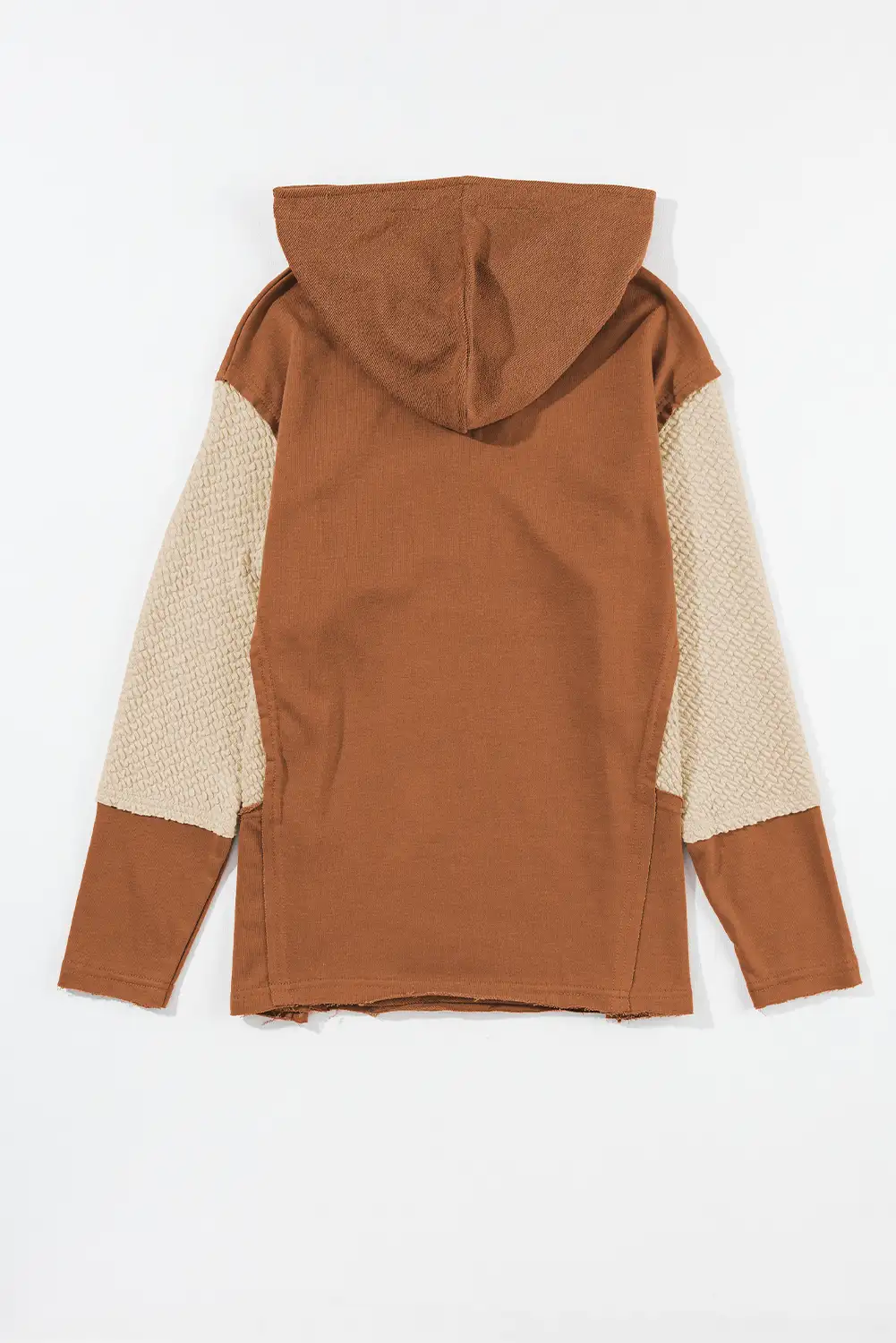 Back view of the hoodie in an uncluttered, sun-washed space