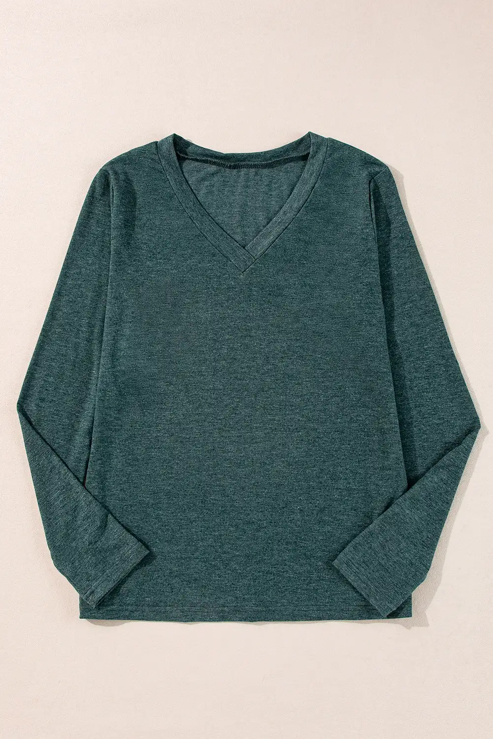 Relaxed long-sleeve top styled for an easy daytime look