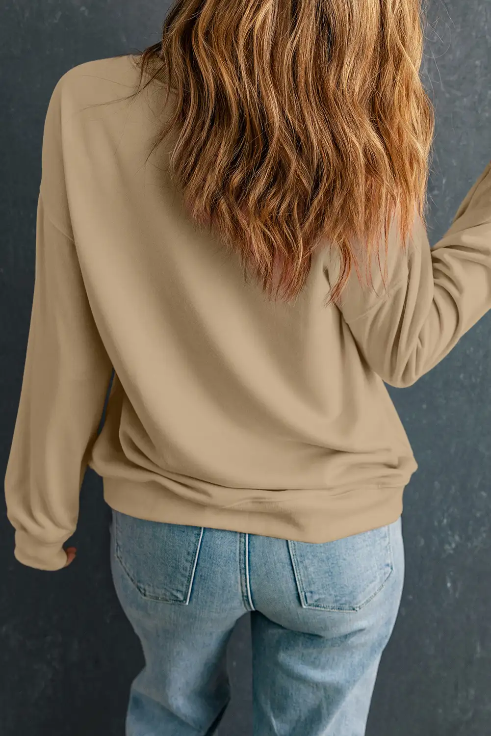 Relaxed fall layering on a warm patio
