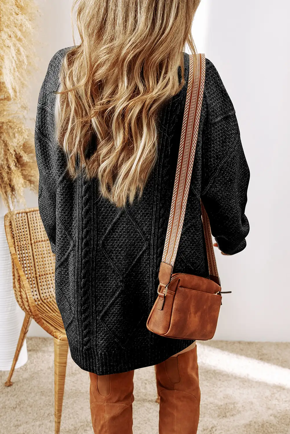Close view of cable knit texture on a cozy winter dress