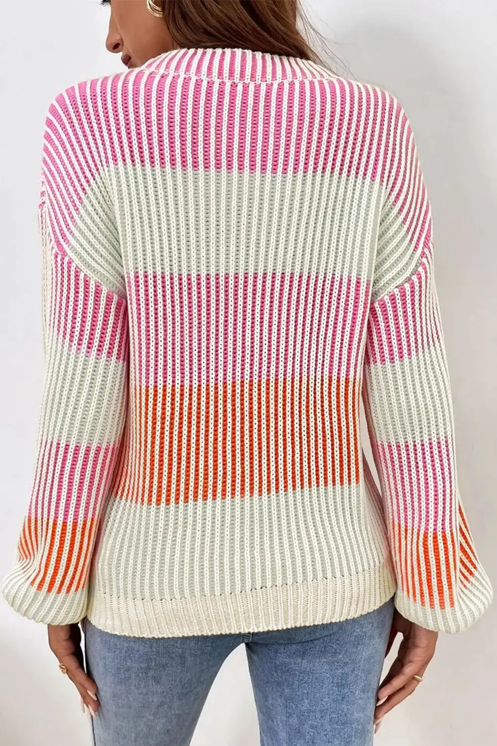 Knit sweater photographed in soft natural daylight