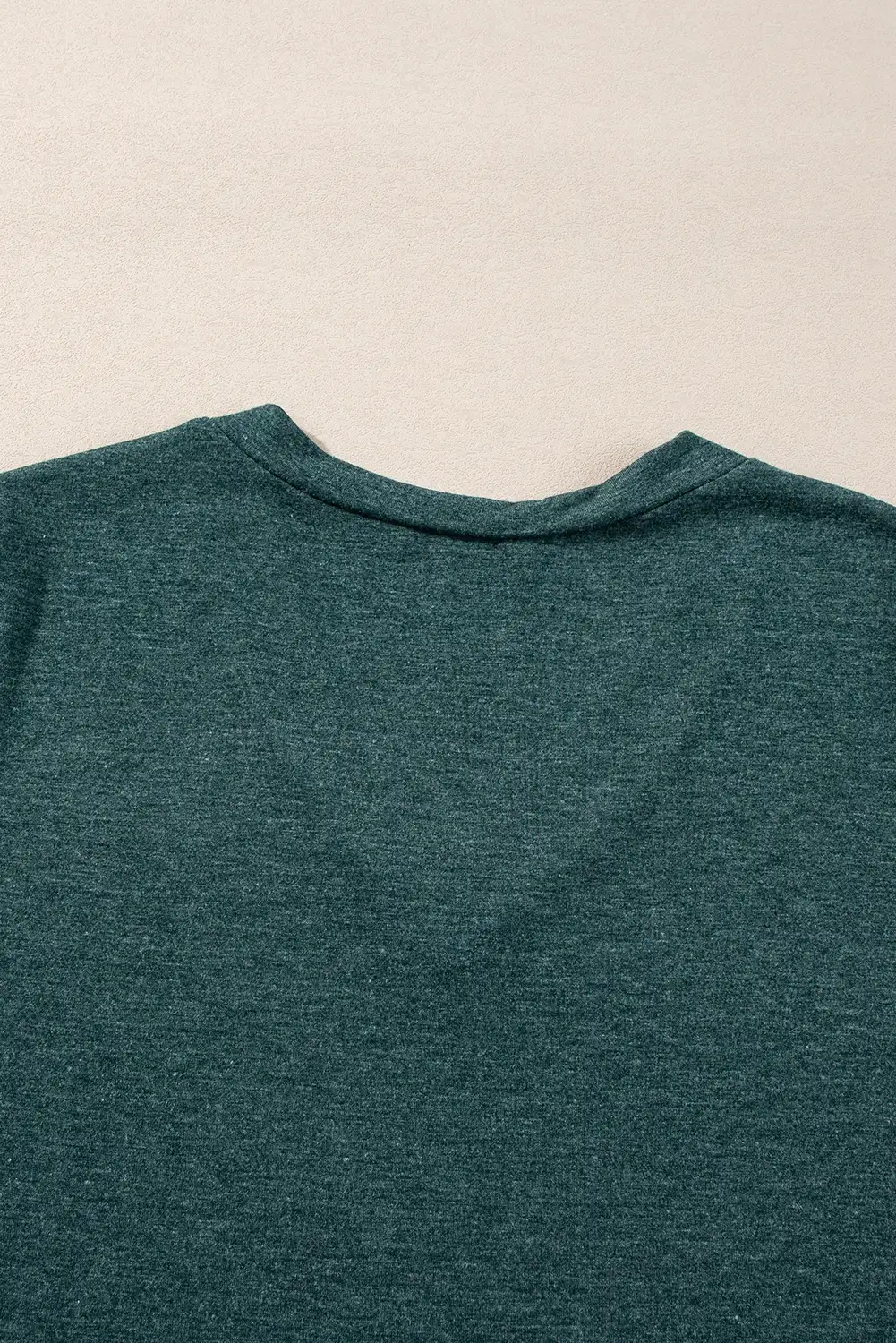 Approachable daytime styling with a calm solid-color top