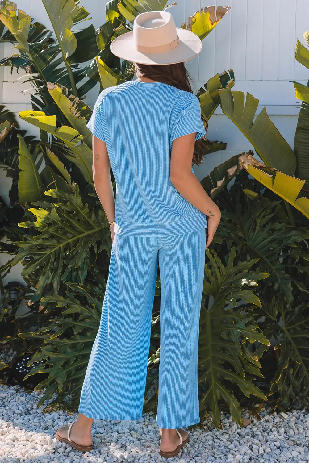 Corded knit two-piece outfit shown from a relaxed, eye-level angle