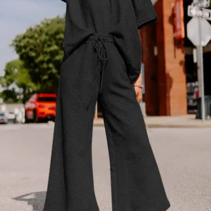Chic Black Textured Loose Fit Casual Two Piece Set Perfect for Summer Relaxation and Stylish Outings