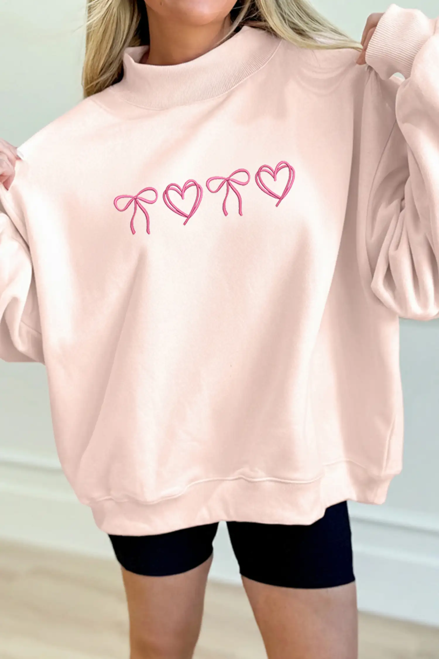 Apricot Pink Bow Heart Embroidered Mock-Neck Sweatshirt