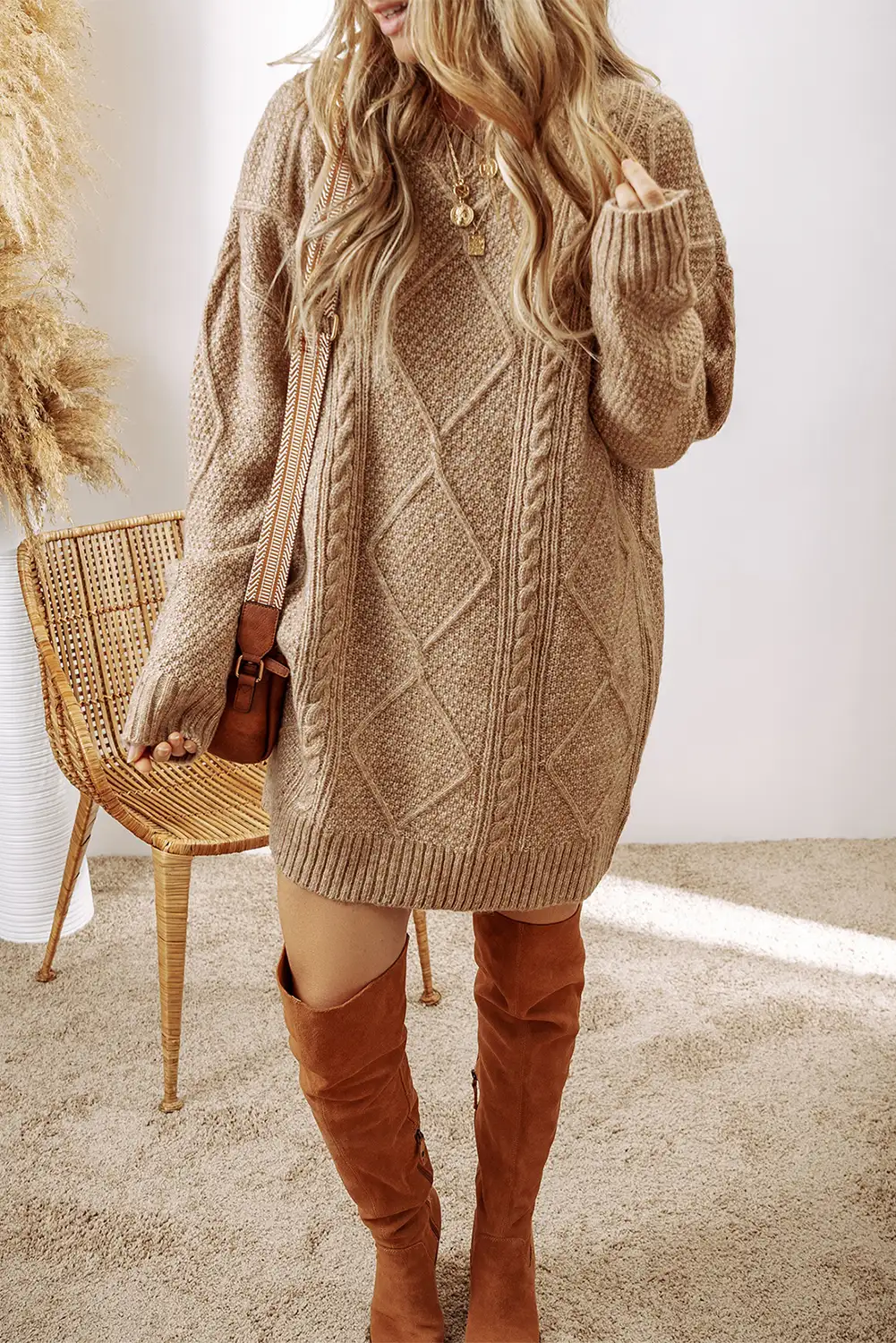 Cable knit sweater dress with a simple bag for an easy day out